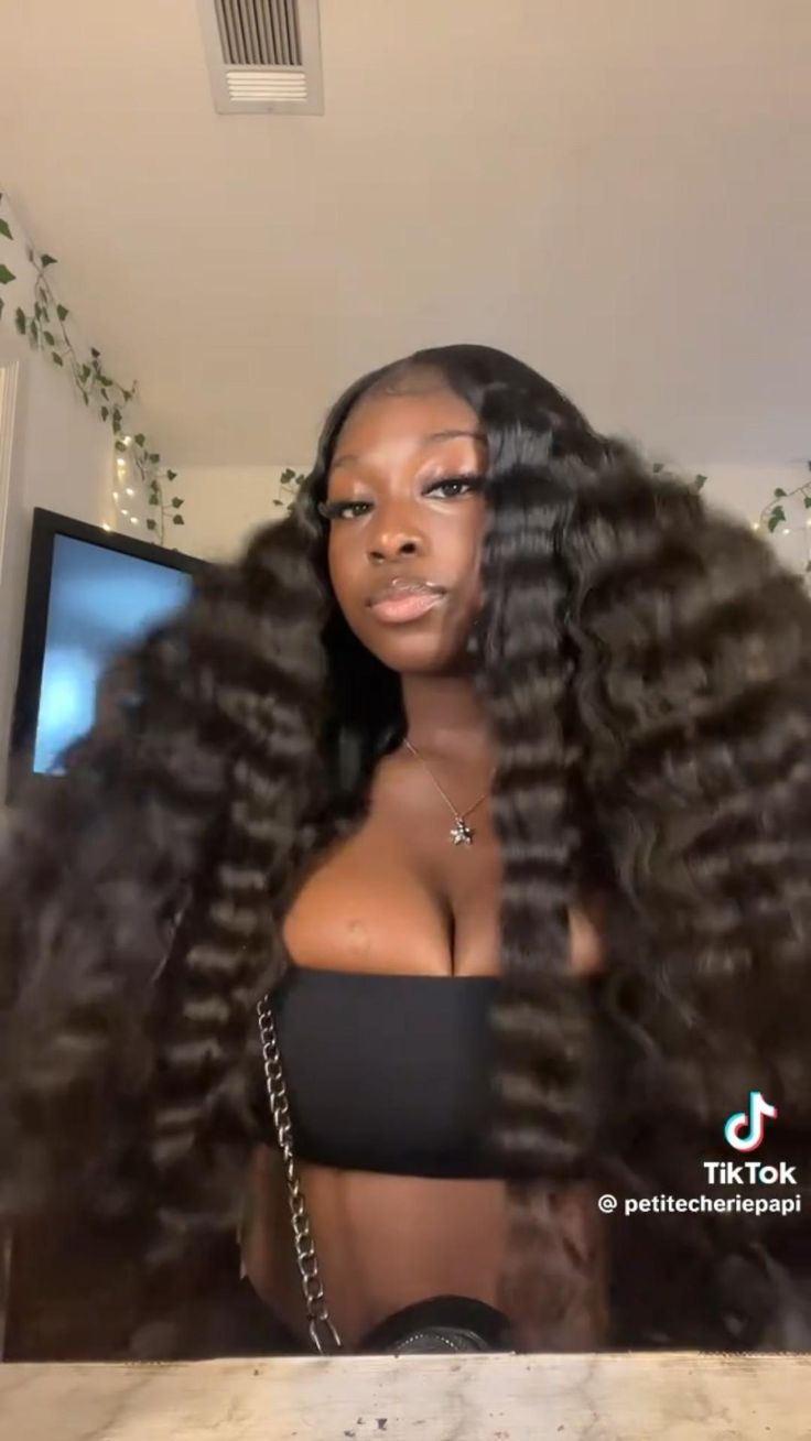 20 Fun and Creative Quick Weave Hairstyles for Black Women You’ll Love! - Side-Swept Glam
