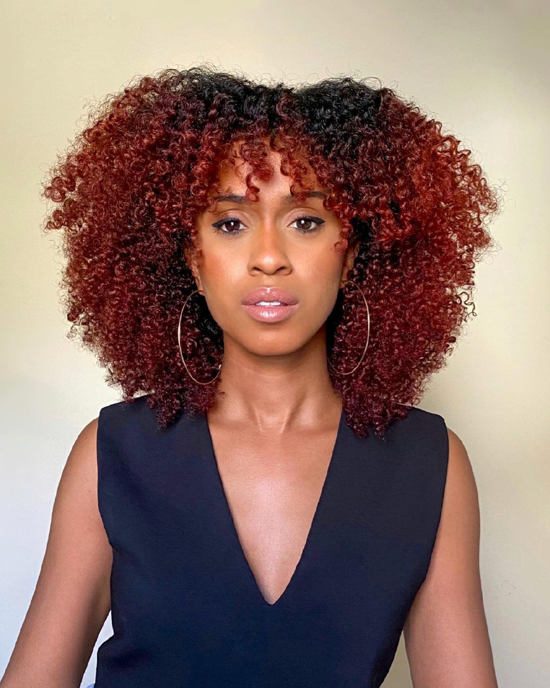 Transform Your Look with These 15 Chocolate Copper Hair Color Ideas (You’ll Love #3!) - 2. Bold Copper Curls